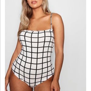 Black and white body suit